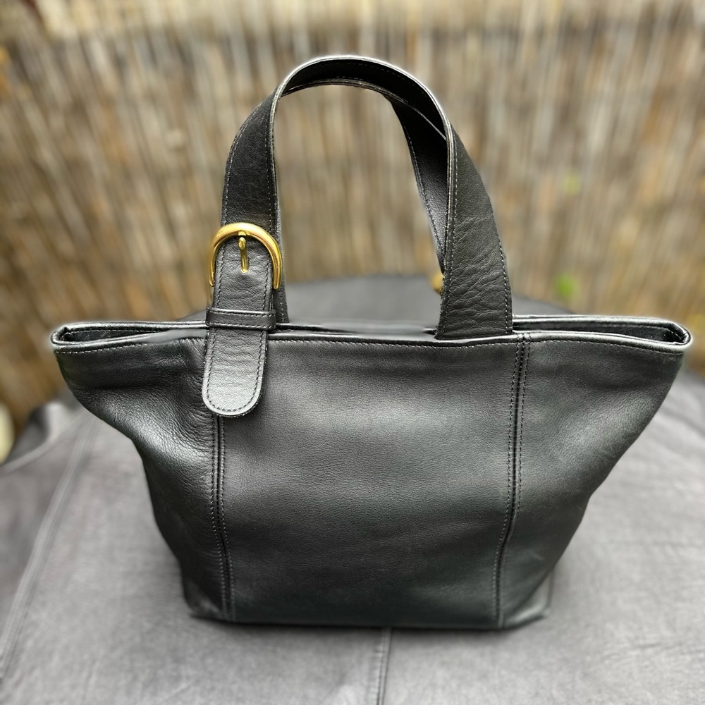 Coach #4133 Waverly Black Genuine Leather Tote with Gold buckles.